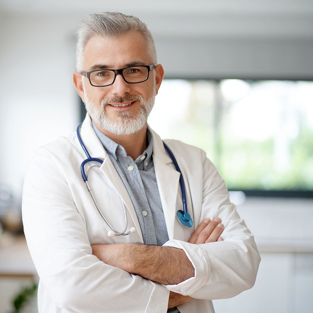 Portrait of mature doctor with eyeglasses